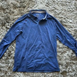 Rhone long sleeve polo. Blue pique look. Medium and lightweight.